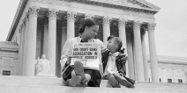 Nettie Hunt and her daughter Nickie sit on the steps of the U.S. Supreme Court. 