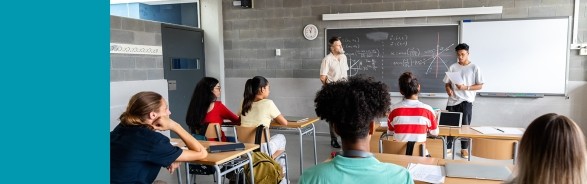 Middle school student giving a presentation in front of the class